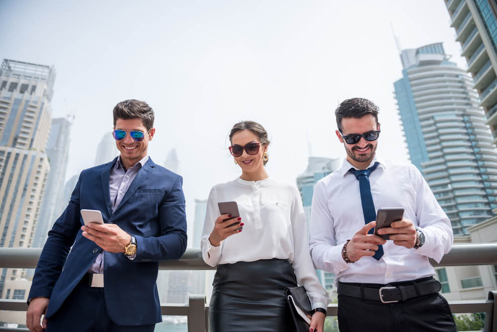 successful-businesspeople-on-their-phones