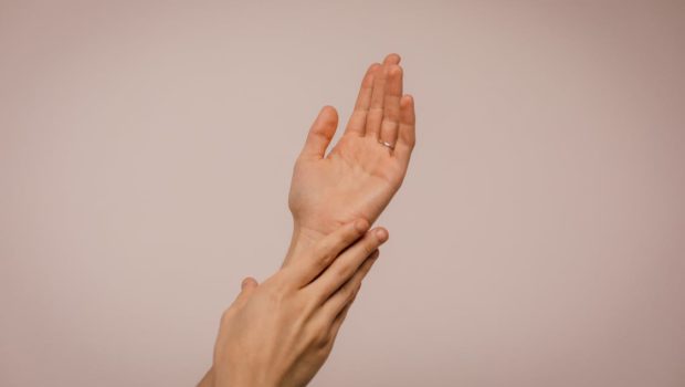 Person Touching Hand