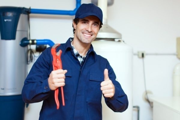 A picture containing person, posing, work-clothing  Description automatically generated