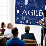 What is project planning according to Agile management principles?