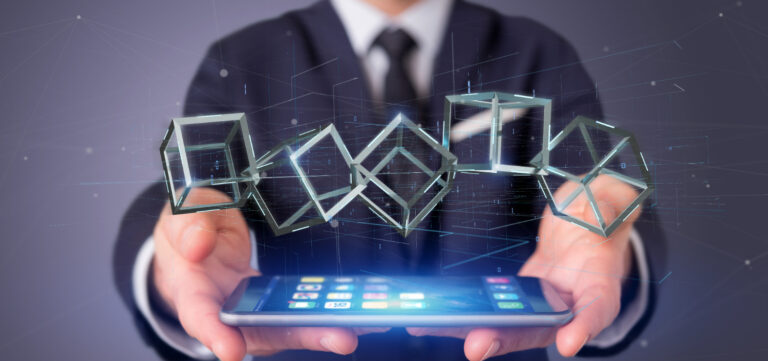 Businessman holding a 3d rendering blockchain cube